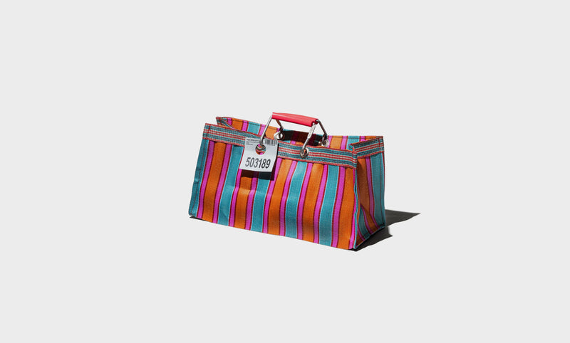 Bolsa de rayas de plástico reciclado Wide - Naranja / Rosa